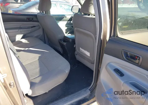 2015 Toyota Tacoma Base V6 z USA, uszkodzony, nr VIN 3TMLU4EN2FM192007